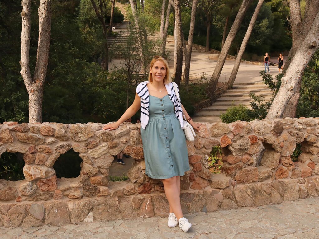 Park Guell in Barcelona Tree-lined walking path in Park Güell, Barcelona.
