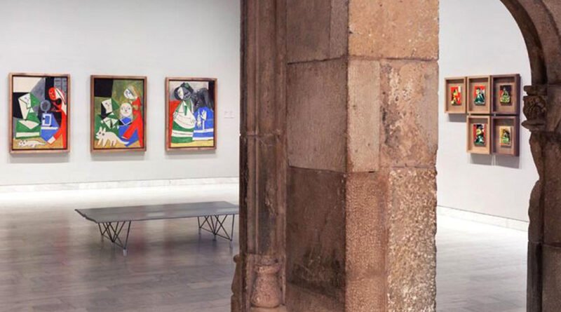 Interior of Picasso Museum in Barcelona with paintings on display.