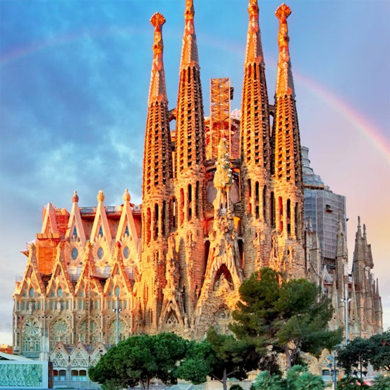 Exterior view of the Sagrada Família showing its intricate towers and detailed façades in Barcelona