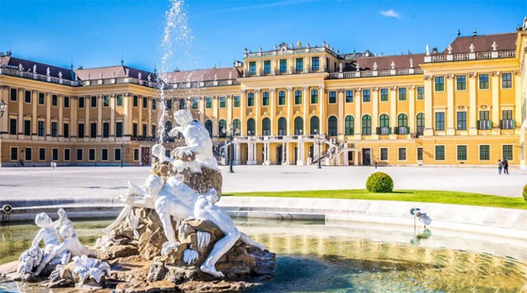Exterior view of the Schönbrunn Palace showing its baroque façade and expansive gardens