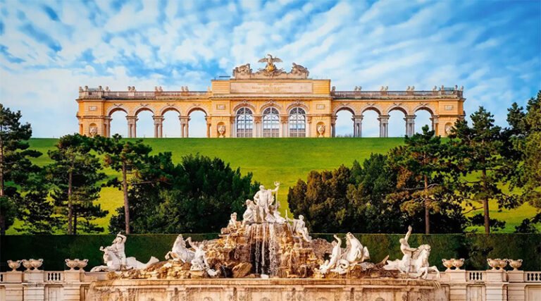 Exterior view of the Schönbrunn Palace showing its baroque façade and expansive gardens