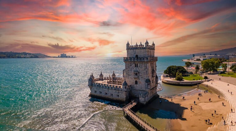 Exterior view of the Belém Tower showing the historic riverside fortress architecture