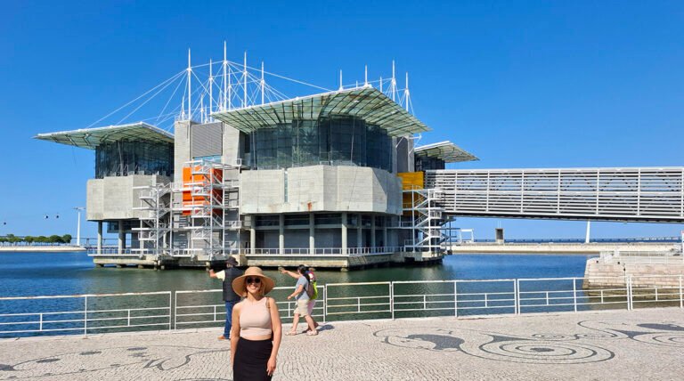 Traveler standing in front of the Lisbon Oceanarium in Lisbon