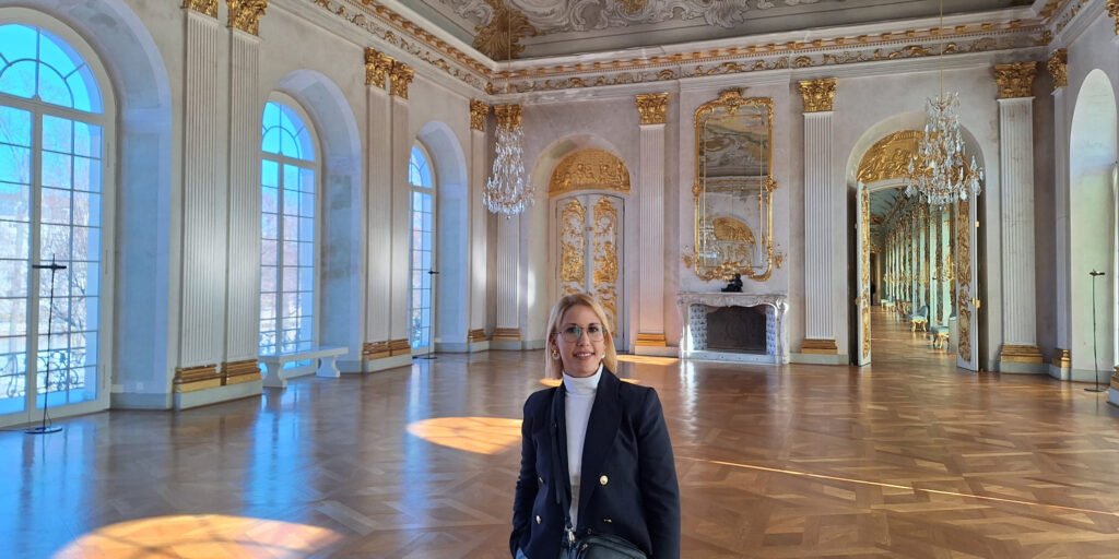 Traveler inside a historic room of Charlottenburg Palace in Berlin