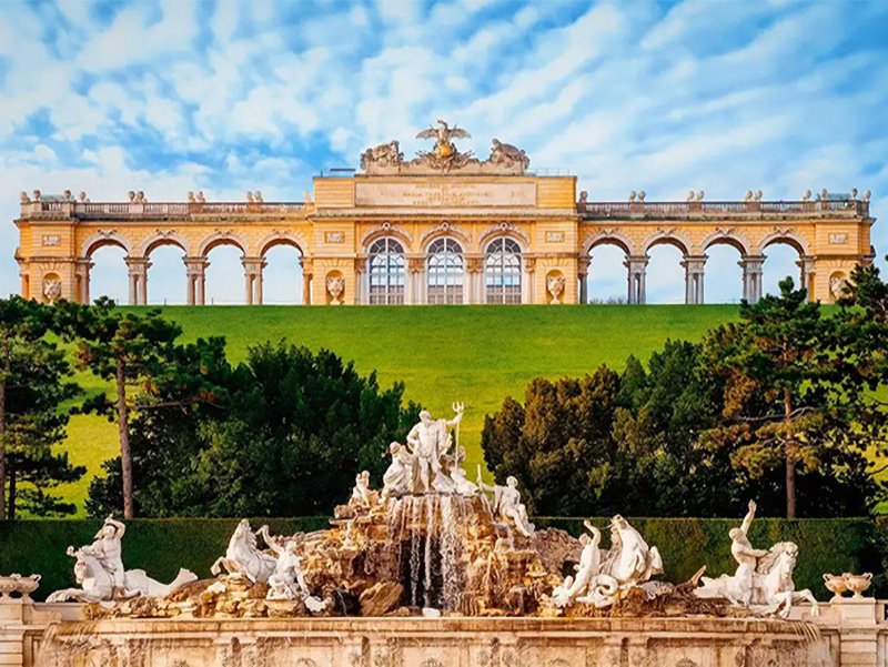 Schonbrunn Palace in Vienna Exterior view of the Schönbrunn Palace showing its baroque façade and expansive gardens