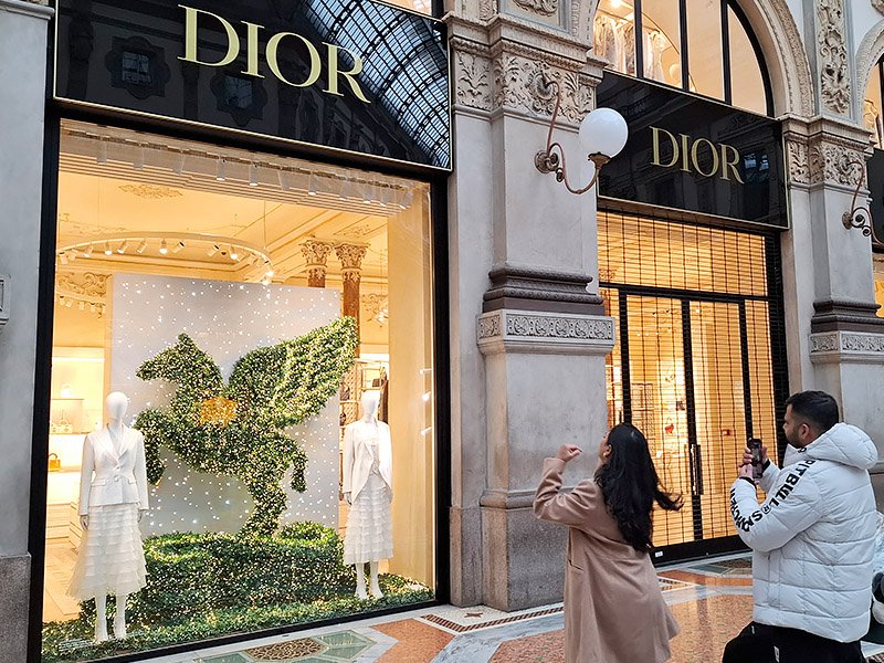 Dior storefront inside Galleria Vittorio Emanuele II in Milan, showcasing luxury fashion within historic 19th-century architecture.
