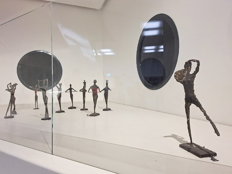 Small modern sculpture displayed in Museo del Novecento in Milan, reflecting early 20th‑century Italian art.