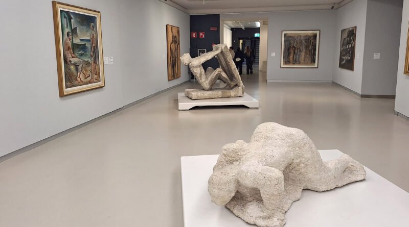 Sculptures displayed in a gallery room of Museo del Novecento in Milan, featuring modern Italian art from the 20th century.