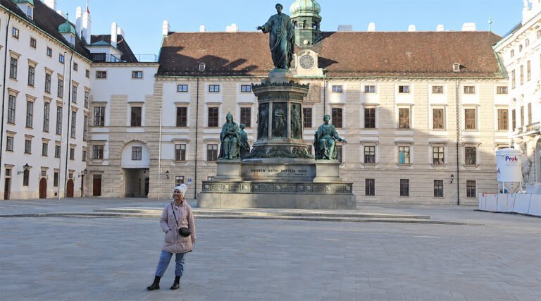 Standing in front of the Hofburg Palace in Vienna, one of the city's most iconic imperial landmarks
