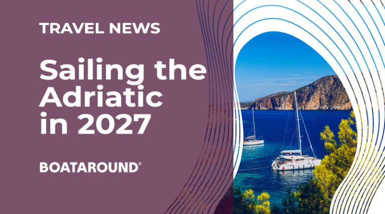 Sailing boat off the Dalmatian coast of Croatia with historic coastal towns and the Adriatic Sea in the background.